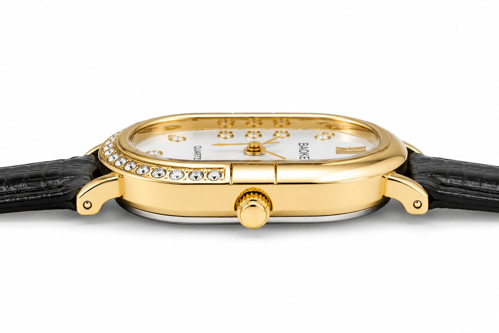 BAOKE Elegant Oval Women's Quartz Watch – Gold Crystal Bezel & Black Textured Leather Strap